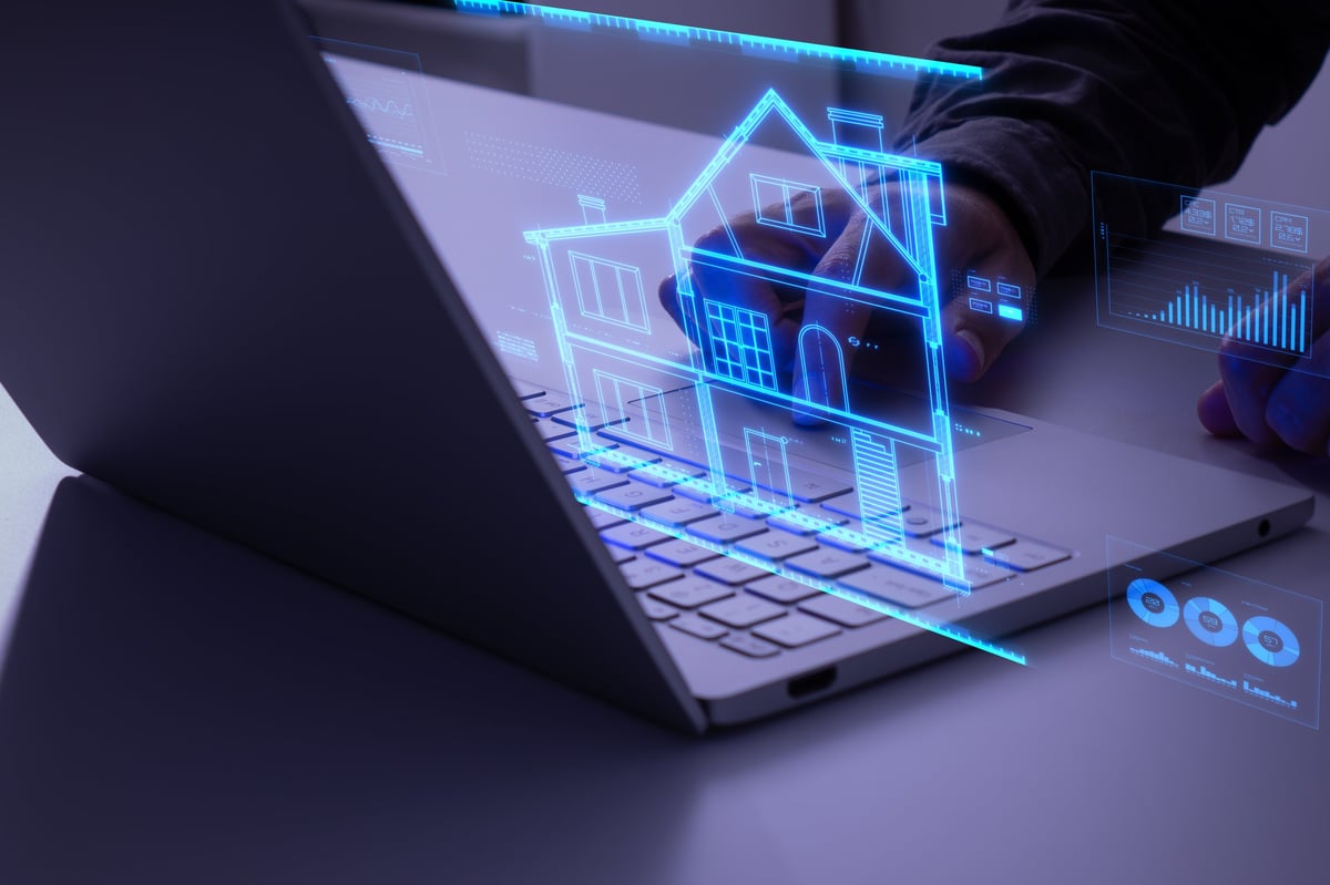 Man interacting with a holographic blueprint of a house